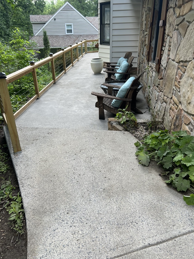 Clean concrete patio after pressure washing