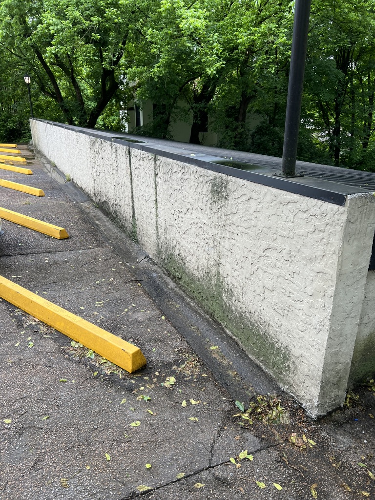 Clean bright white stucco wall after pressure washing
